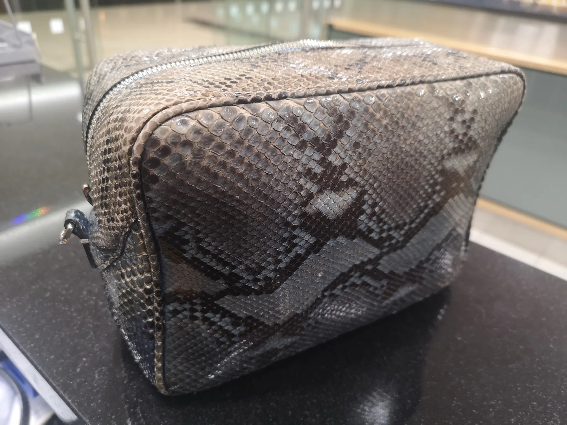 Python leather cosmetic bag after handle repair - The Cobbler's Studio Banstead